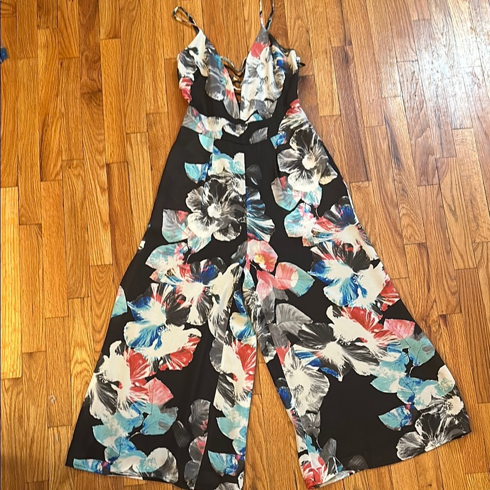 NWT- bebe Black Jumpsuit with Floral Pattern and Wide-Leg Design